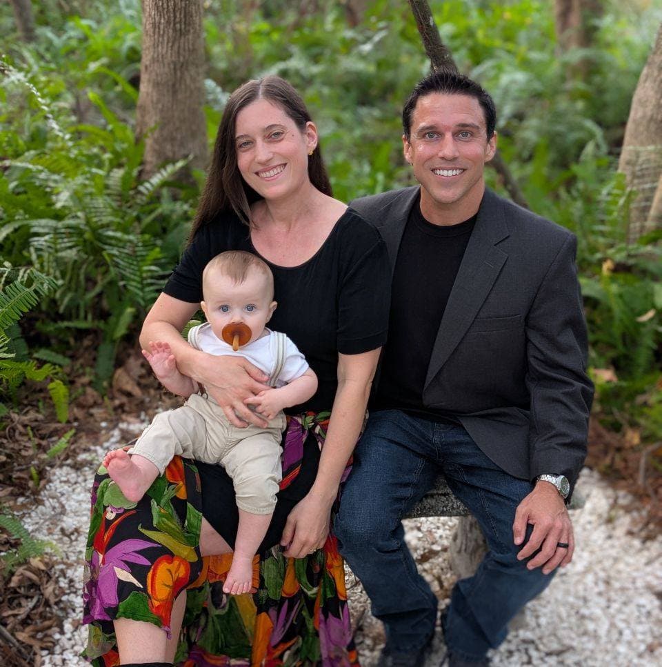 Rachel, Alex, and Jack on their wedding day